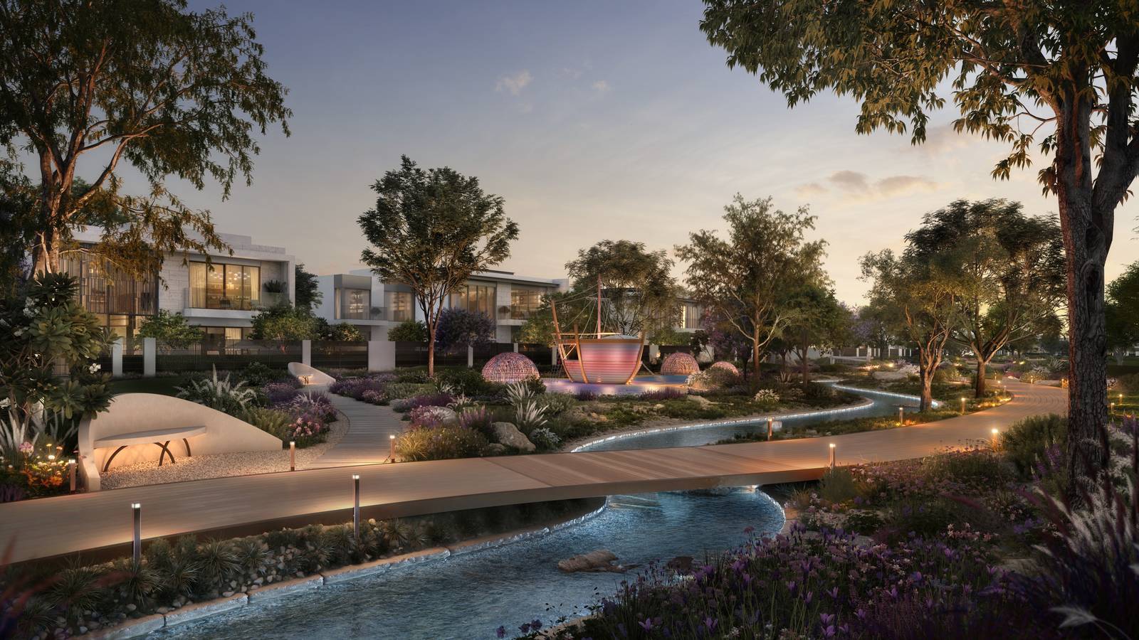 Landscaped waterway and gardens at Talay, Marsa Al Saadiyat, at dusk